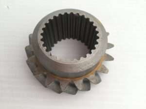 Metal gear with internal teeth on white background.